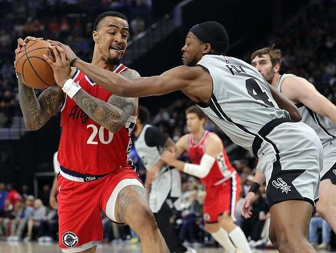 马刺团队协作力克快船豪取11连胜